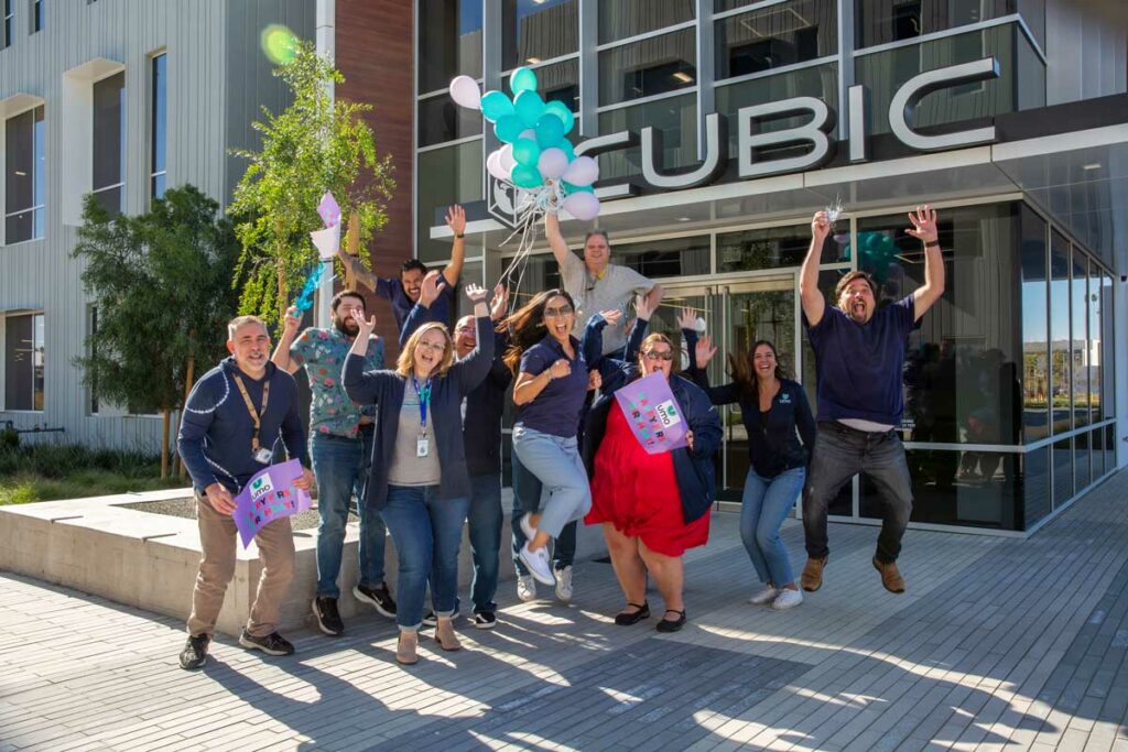 umo team in front of cubic offices