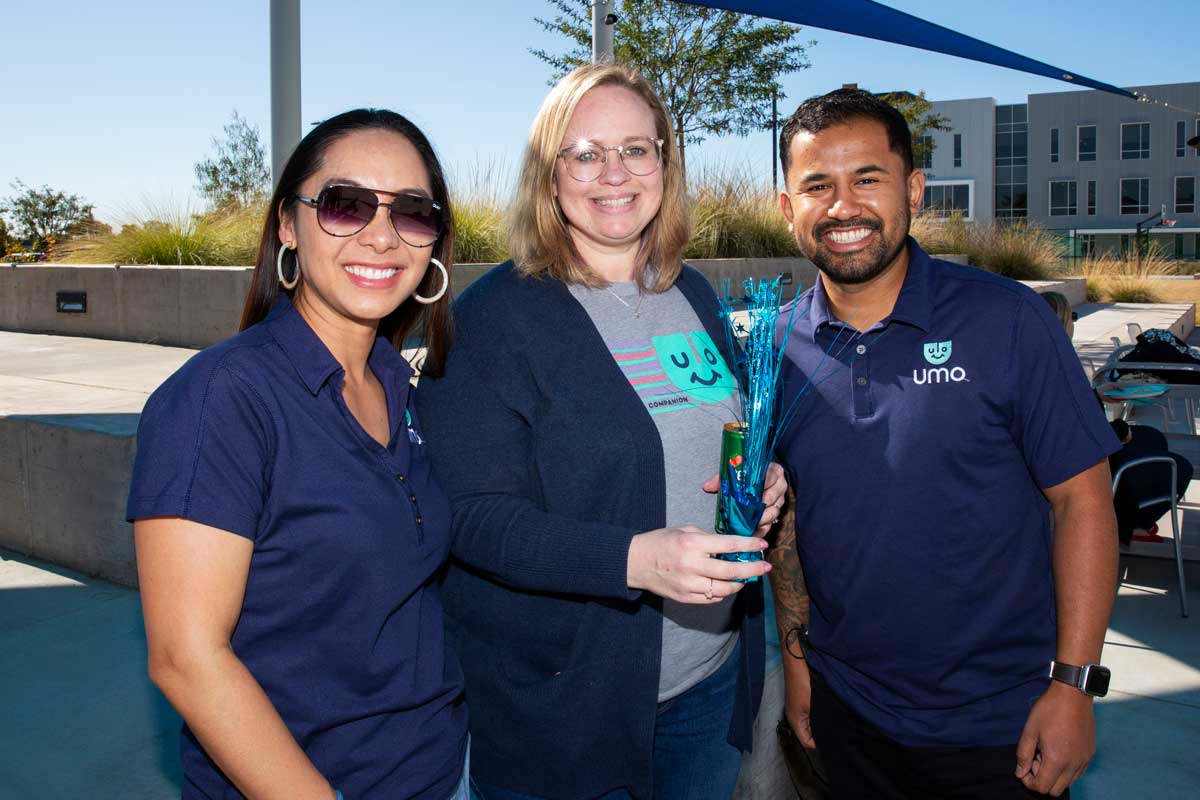 three umo team members standing together