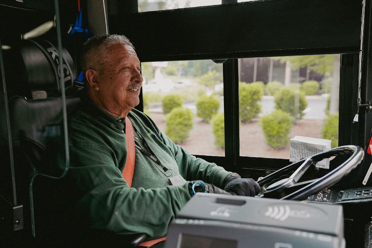 Bus driver smiling